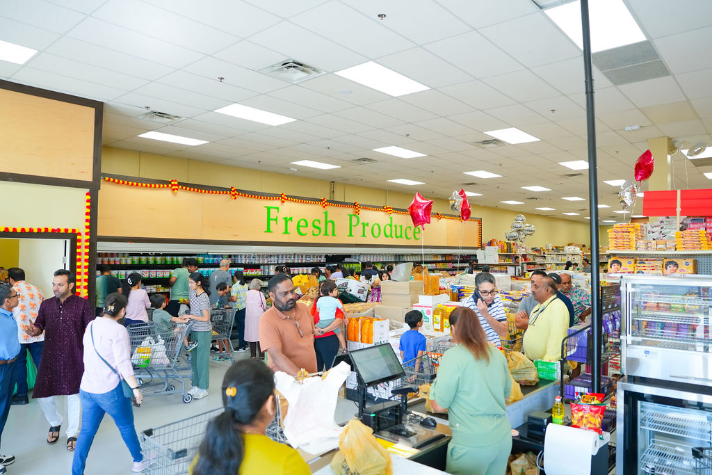 Busy checkout counters on opening day at Reliance Mart