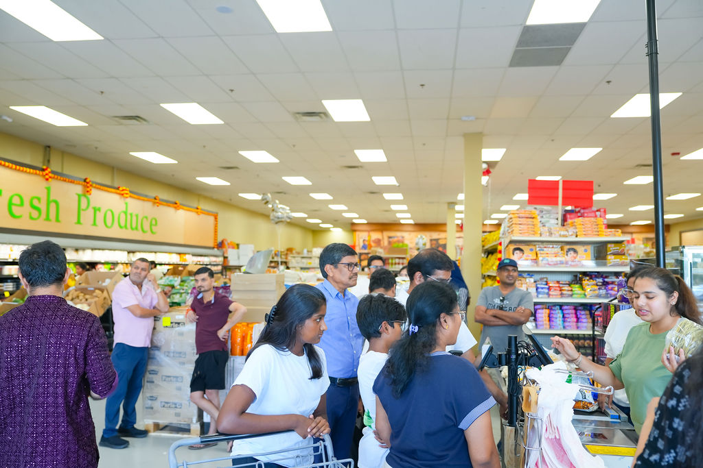 Neighbors lining up at Reliance Mart on opening day